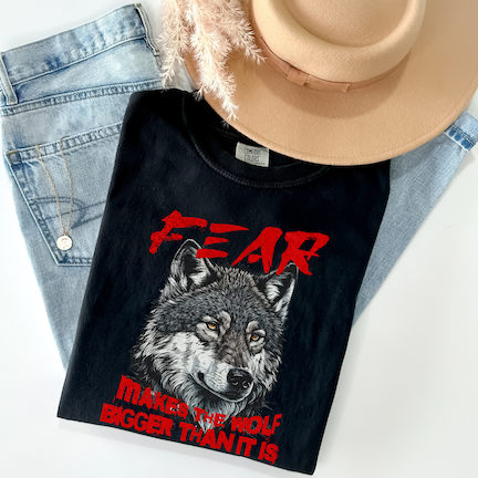 Fear Makes the Wolf Bigger Than It Is Empowerment Graphic T-Shirt